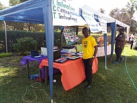 An ICT club Patron posing at the Clubs Show case