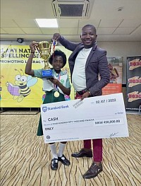 Miracle Labeka posing with the CEO of Diversity Academy, Mr J. Ntopa